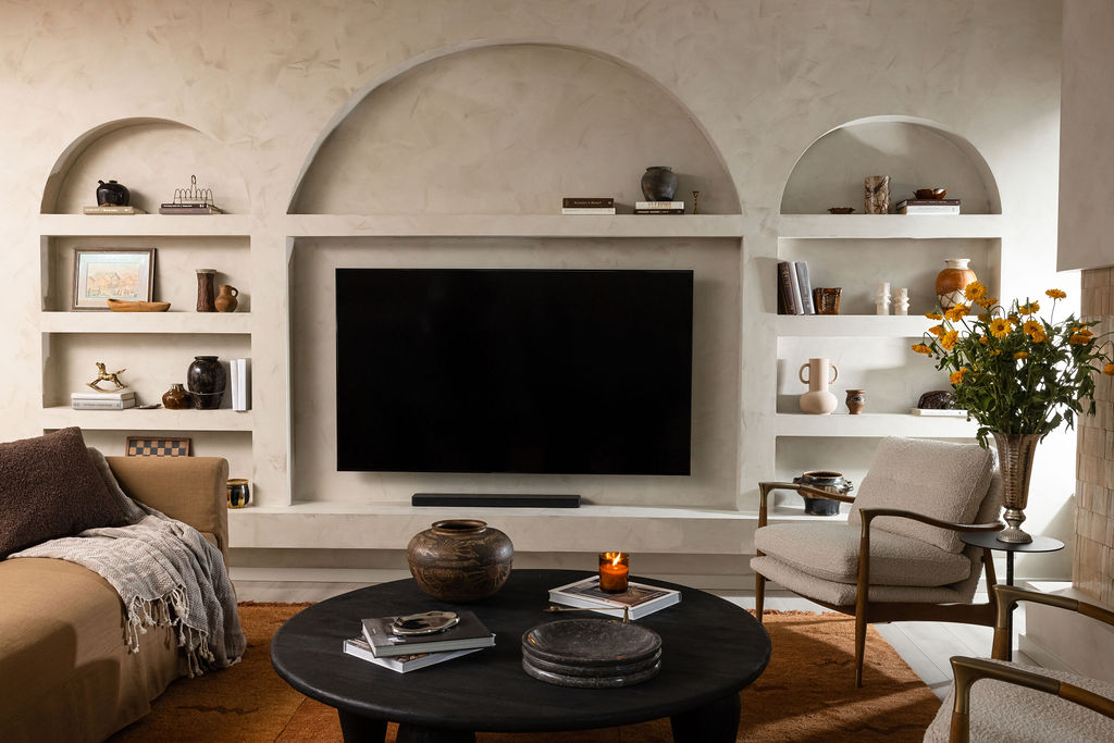 Warm interior living room designed by NU Curations