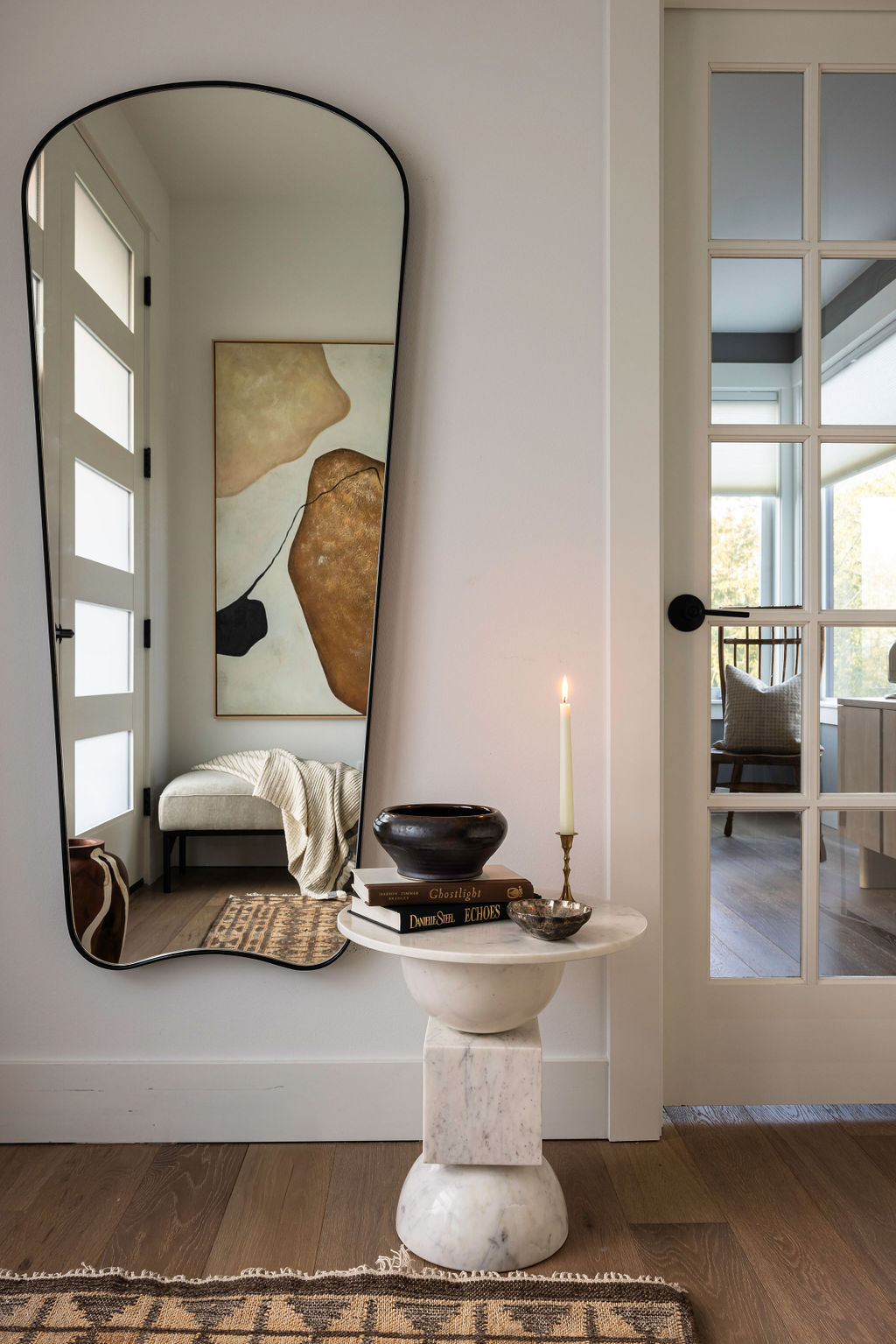 NU Curations interior design project featuring entry with large mirror