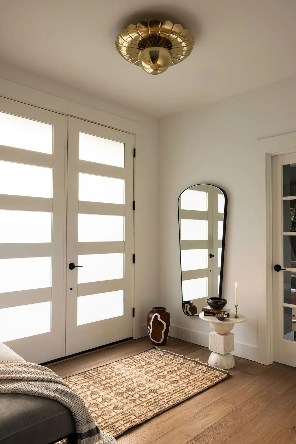 Kenmore Treeside detail with entryway brass flush mount light