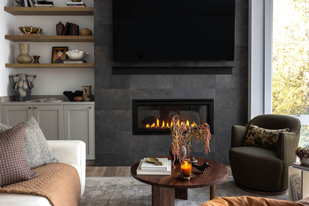 Kenmore Treeside featuring living room shelf tv above fireplace