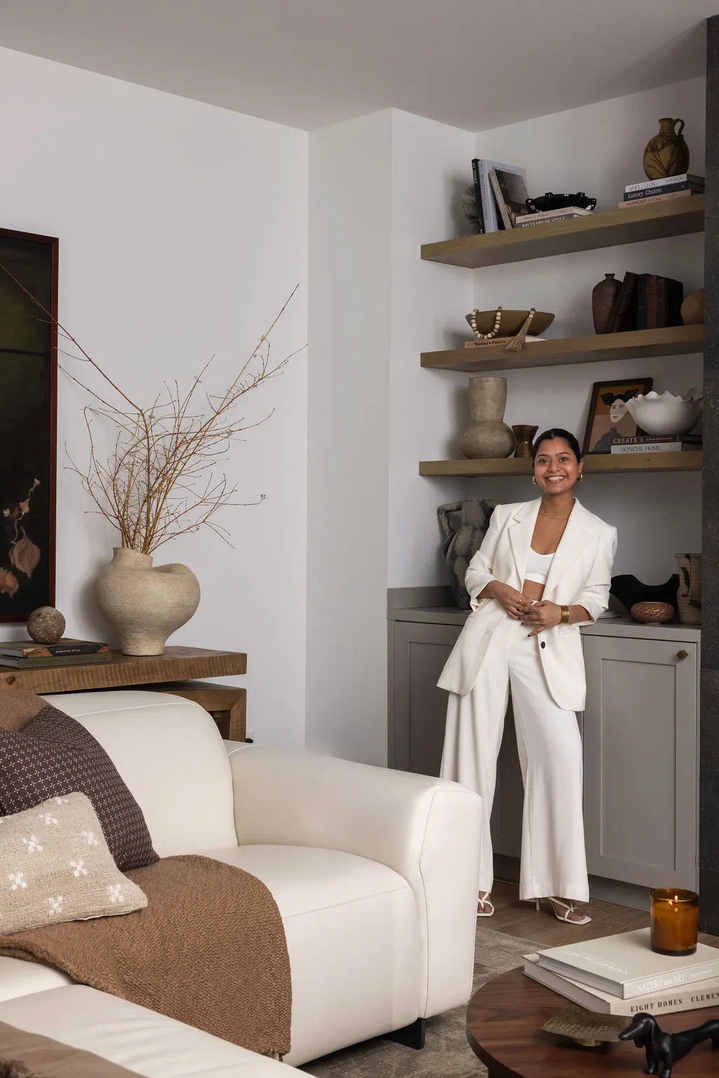 Neha Gupta of NU Curations in living room
