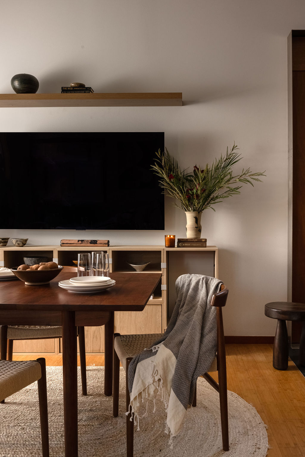 NU Curations project detail detail with modular console under tv