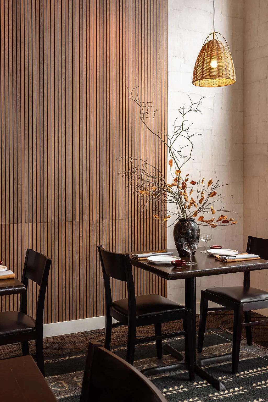 Thekoi Sushi & Sake Bar featuring autumn branches marble vase restaurant