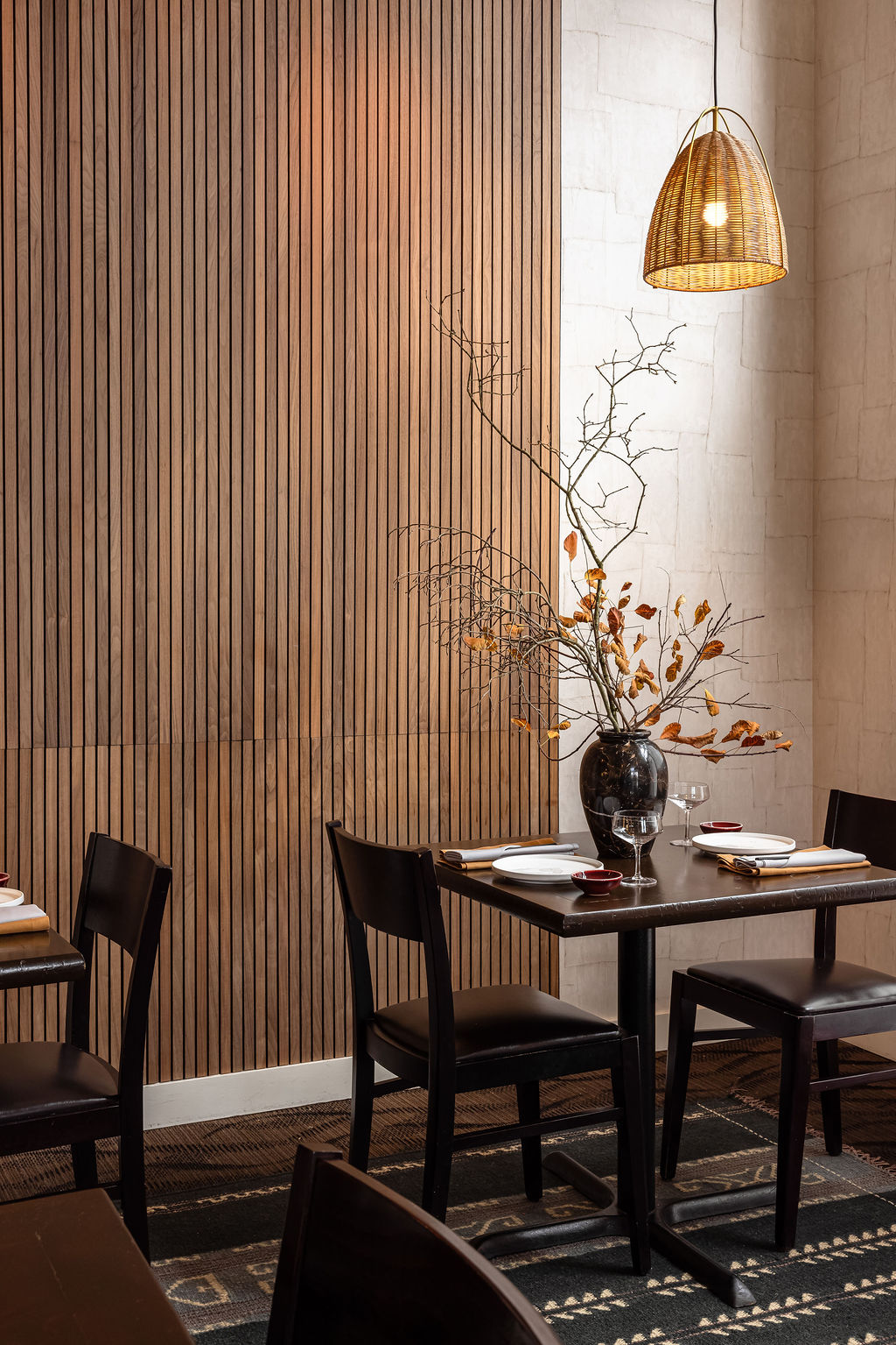 Thekoi Sushi & Sake Bar featuring tree brances in vase restaurant