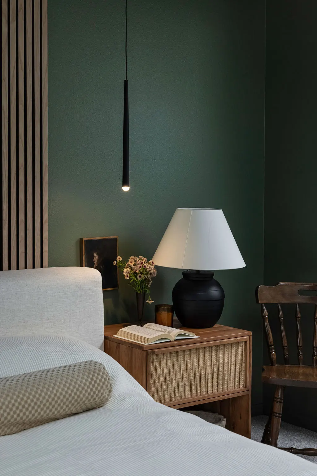 The Timara House featuring green bedroom nightstand styling